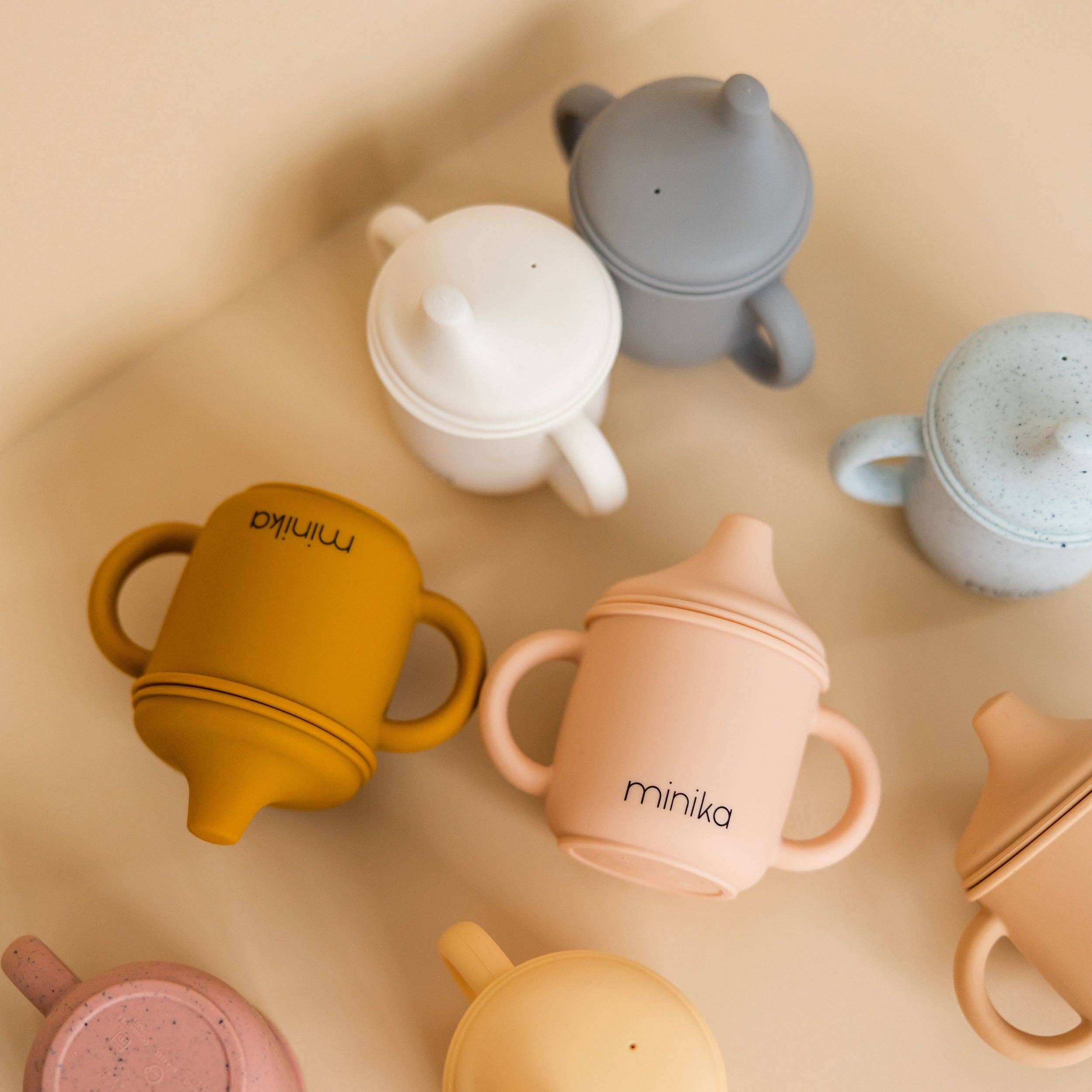 Tasse d’apprentissage en silicone avec poignées – Coquillage